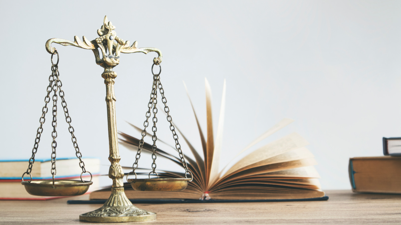 Law Firm stock Photo with Books Open on desk