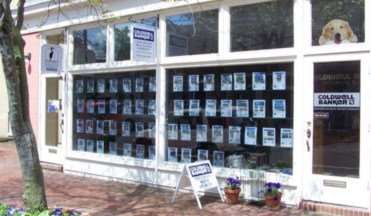 coldwellbanker_featuredimage Front Entrance of Coldwell Banker in Chestertown, Maryland with Listing Flyers in Window