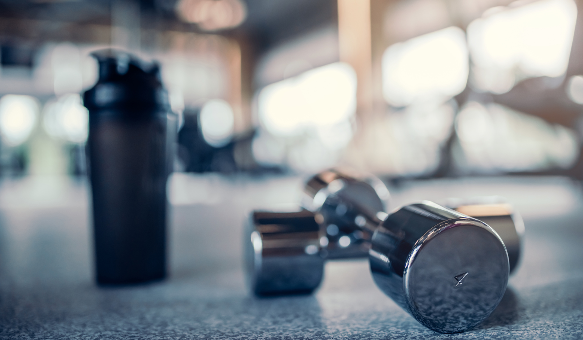 stock image of a water bottle and weights